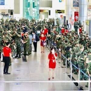 Hanoi flies 10,000 troops to HCMC for Covid containment